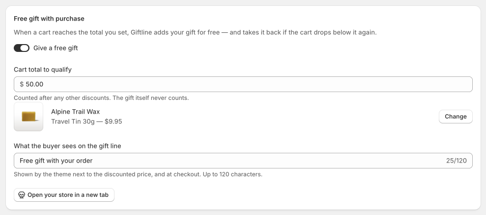 Giftline's settings card in the Shopify admin: a "Give a free gift" toggle turned on, a cart total to qualify set to $50.00, the chosen gift product Alpine Trail Wax, and the buyer-facing text "Free gift with your order".